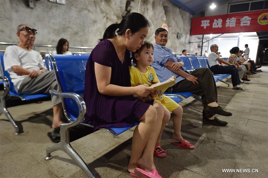 The local government opened bomb shelters for people to enjoy the cool in Fuzhou.