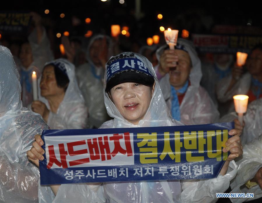 Photo taken on Aug. 2, 2016 shows banners expressing opposition to the deployment of the Terminal High Altitude Area Defense (THAAD) in Seongju county, South Korea