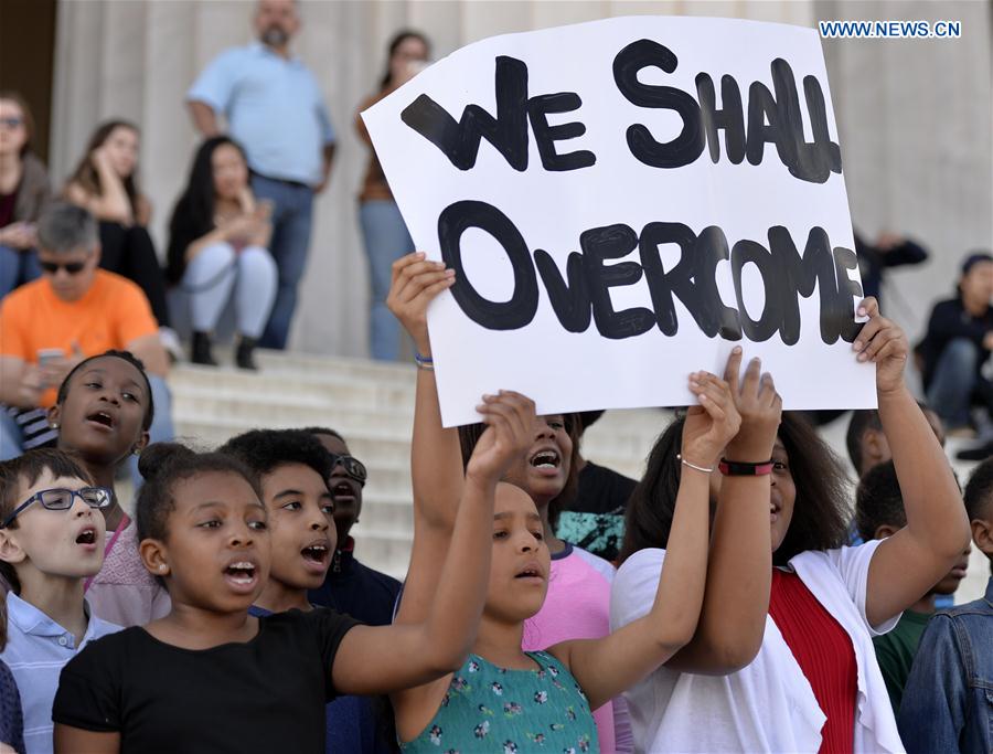 Students of Watkins Elementary School participate in the 13th annual reading of Martin Luther King's 'I Have a Dream' speech event at Lincoln Memorial in Washington D.C., capital of the United States, on Feb. 24, 2017 to commemorate the civil rights leader. 