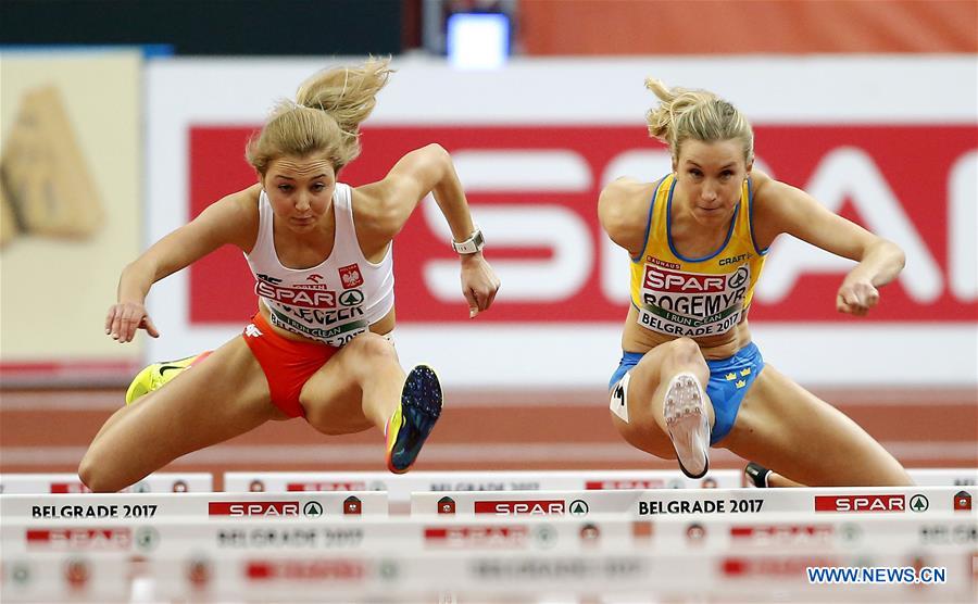 Karolina Koleczek of Poland (L) and Maja Rogemyr of Sweden compete in women's 60-meter hurdles during the 2017 European Athletics Indoor Championships at the Kombank Arena in Belgrade, Serbia, March 3, 2017. (Xinhua/Predrag Milosavljevic) 