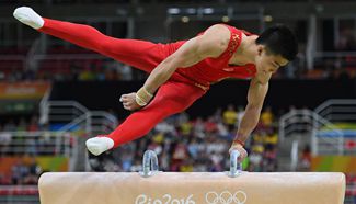 Chinese gymnasts compete in men's team final of Artistic Gymnastics