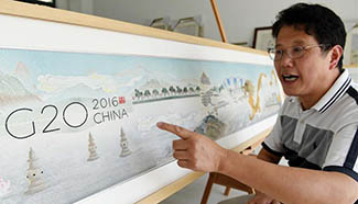 Local residents make silk scroll to greet G20 Hangzhou summit