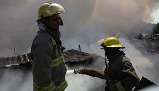 Construction wood market catches fire in Afghan capital
