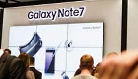 Samsung shares down after production halt