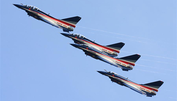 J-10 fighter jets of China's Bayi Aerobatic Team perform in Zhuhai