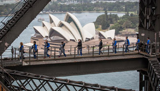 Chinese tourists participate in Bridge Climb at Sydney Harbour Bridge