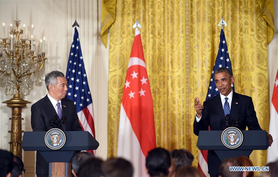 U.S.-WASHINGTON D.C.-OBAMA-SINGAPORE-PM-PRESS CONFERENCE