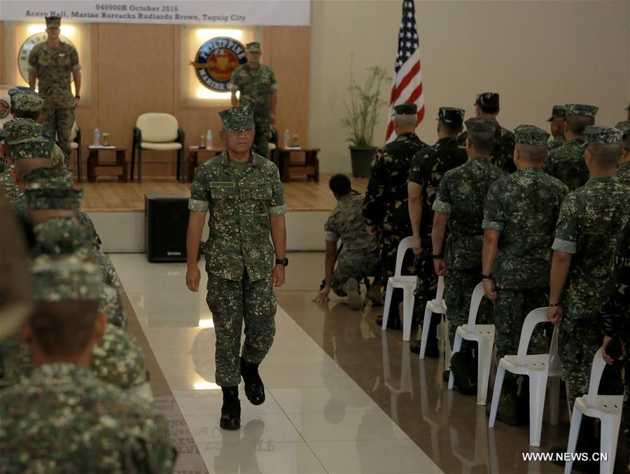 U.S. and Philippine marines and sailors kicked off on Tuesday what could be their last joint military exercises in the Philippines' main Luzon island and Palawan