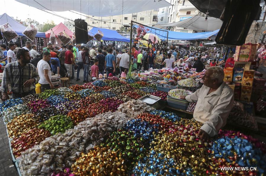 Sweets Sold At Market Ahead Of Eid Al Fitr In Gaza City Xinhua English News Cn