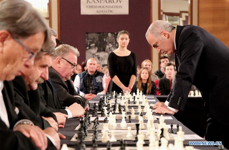 Chess master plays simultaneous exhibition against locals