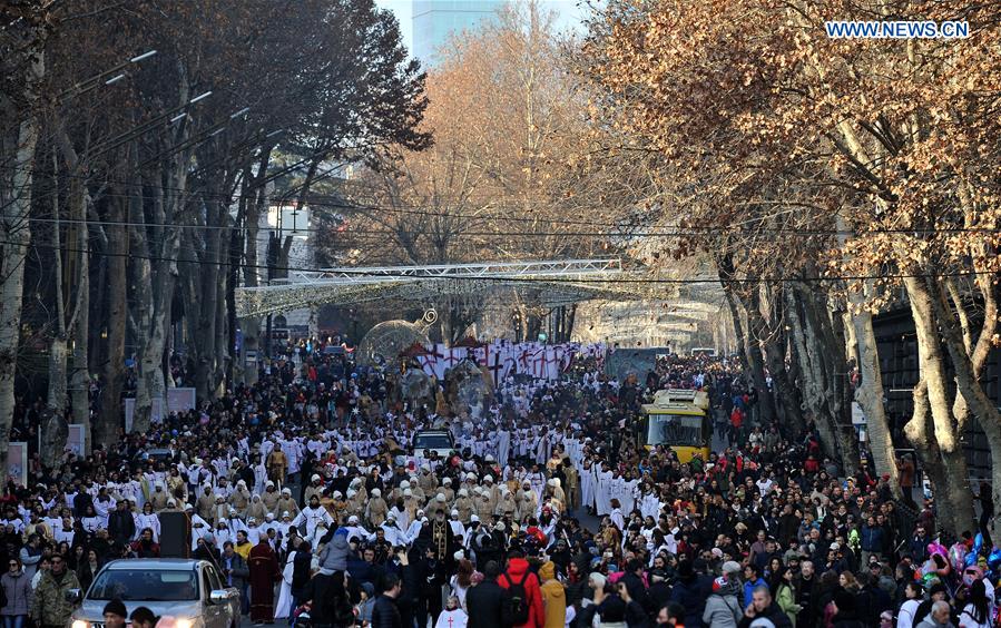 Tbilisi, Georgia. 7th Jan, 2016. Georgian people march during Alilo, a  religious procession, to celebrate the Orthodox Christmas in Tbilisi,  capital of Georgia, on Jan. 7, 2016. Georgians celebrate Christmas on Jan.