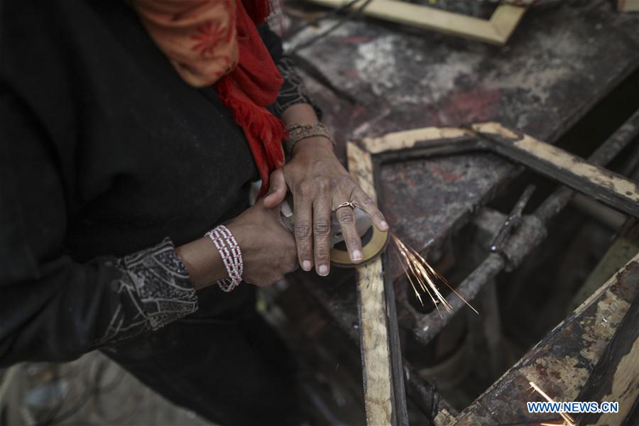 MIDEAST-GAZA-MARKET-WOMAN-DAY