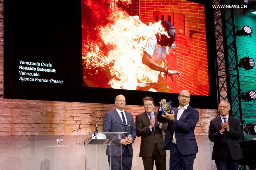 THE NETHERLANDS-AMSTERDAM-WORLD PRESS PHOTO-PHOTO OF THE YEAR-RONALDO SCHEMIDT