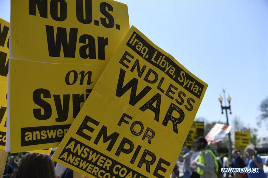 people protest against u.s. strike on syria in washington d.c.