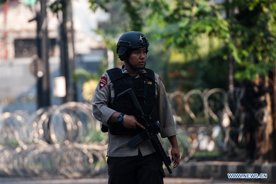 all terrorist inmates surrender after police strike in indonesia