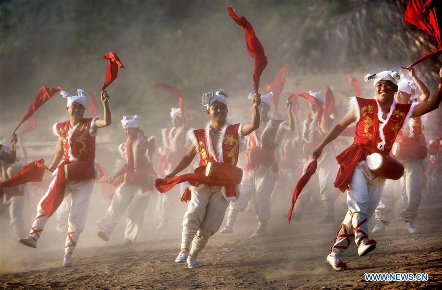 Villagers perform Ansai waist drums in Yan'an, NW China's Shaanxi - Xinhua