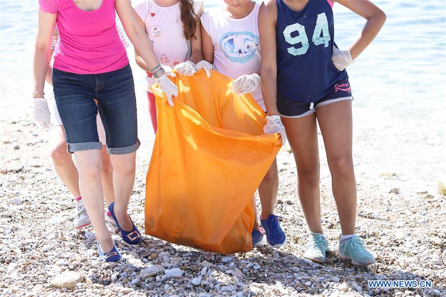 GREECE-PIRAEUS-BEACH CLEANING 