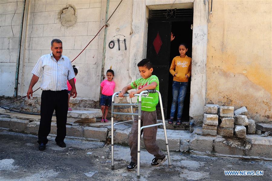 SYRIA-ALEPPO-SYRIAN BOY-PARALYSIS LEFT BY WAR