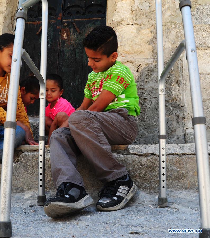 SYRIA-ALEPPO-SYRIAN BOY-PARALYSIS LEFT BY WAR