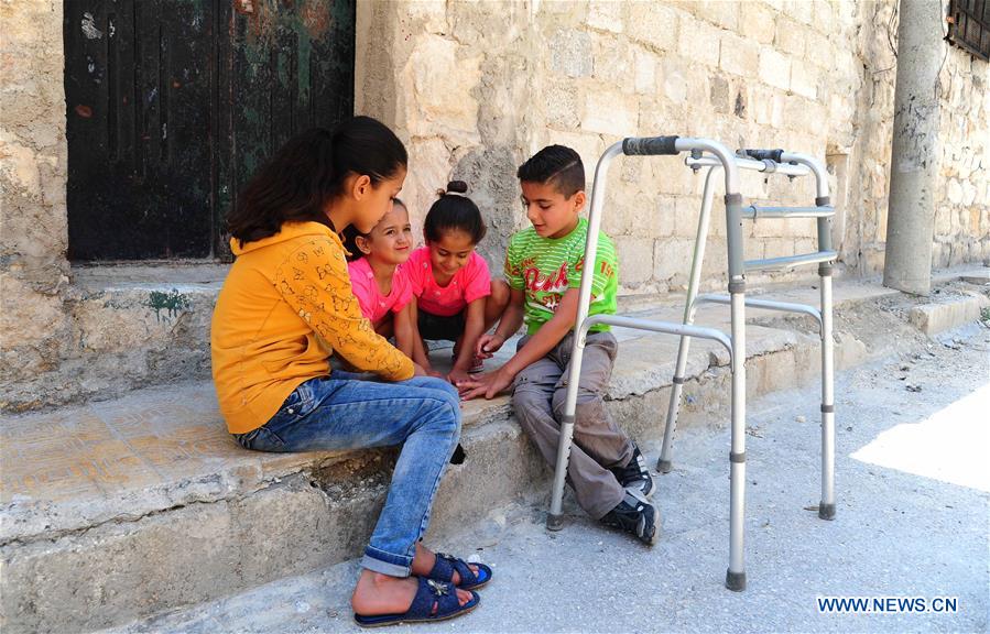 SYRIA-ALEPPO-SYRIAN BOY-PARALYSIS LEFT BY WAR