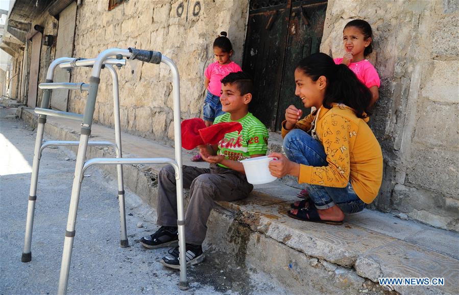 SYRIA-ALEPPO-SYRIAN BOY-PARALYSIS LEFT BY WAR