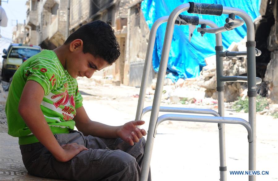 SYRIA-ALEPPO-SYRIAN BOY-PARALYSIS LEFT BY WAR