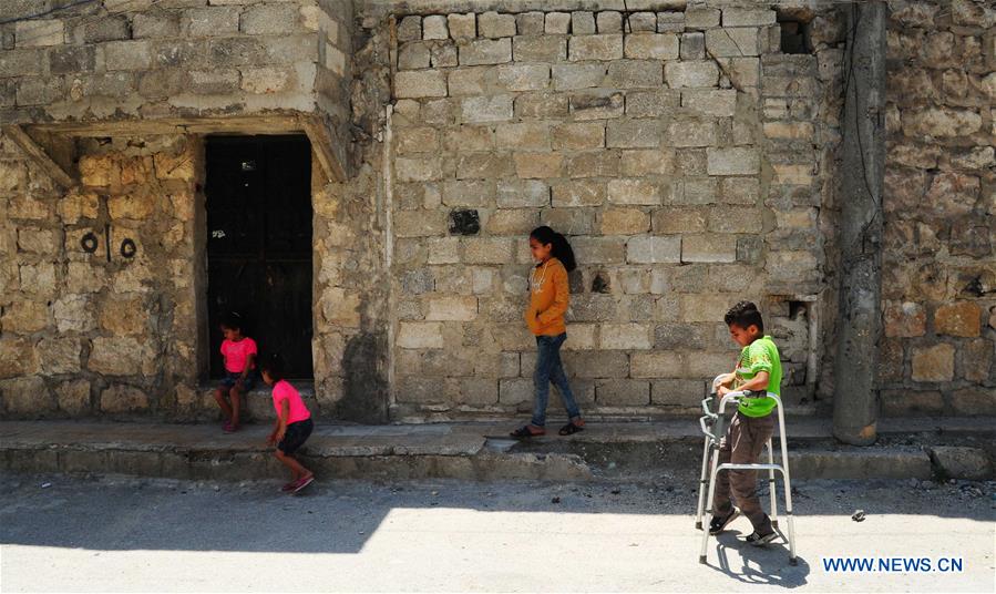 SYRIA-ALEPPO-SYRIAN BOY-PARALYSIS LEFT BY WAR