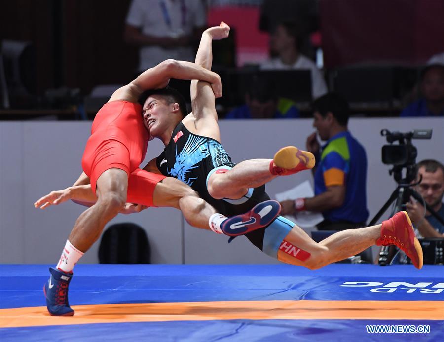 Highlights of men's freestyle wrestling at 18th Asian Games Xinhua