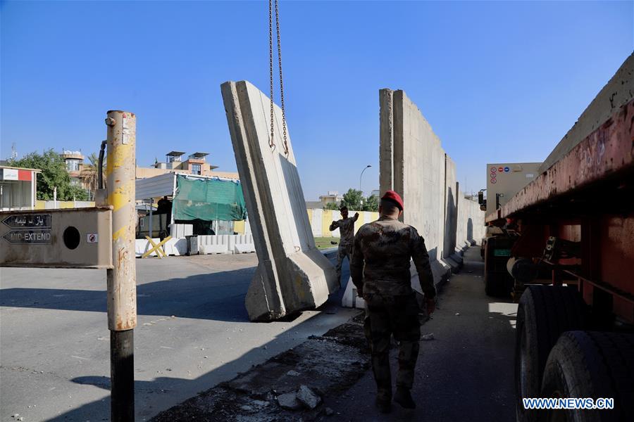 Iraqi Authorities Continue Removing Concrete Walls Surrounding Baghdad 