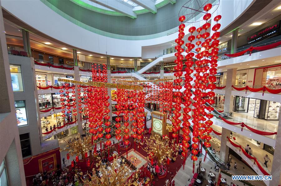 People visit Chinese New Year decoration A Regal Celebration in