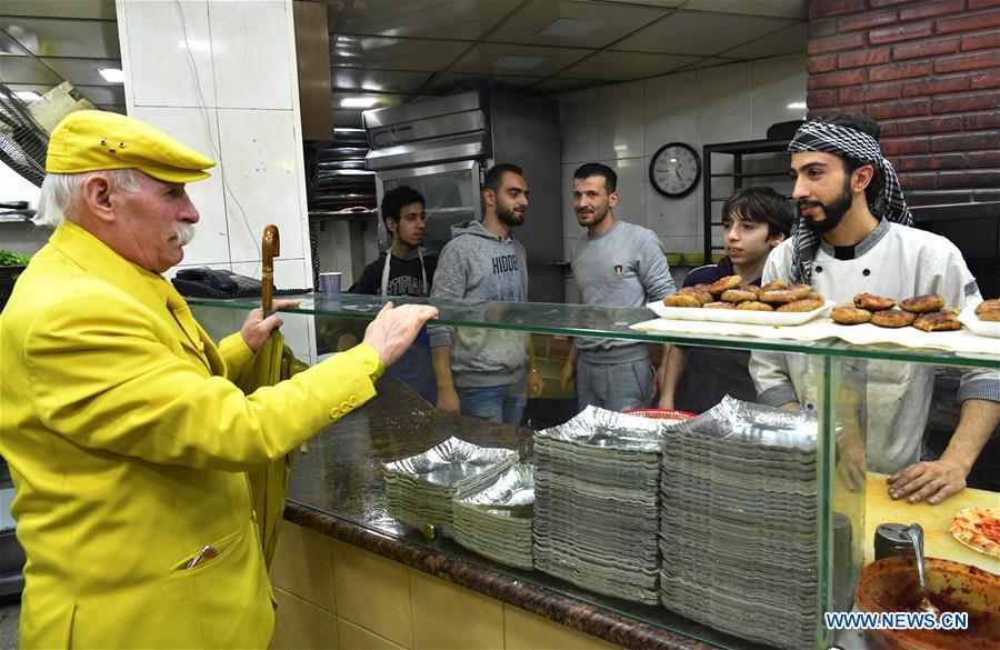 SYRIA-ALEPPO-YELLOW MAN