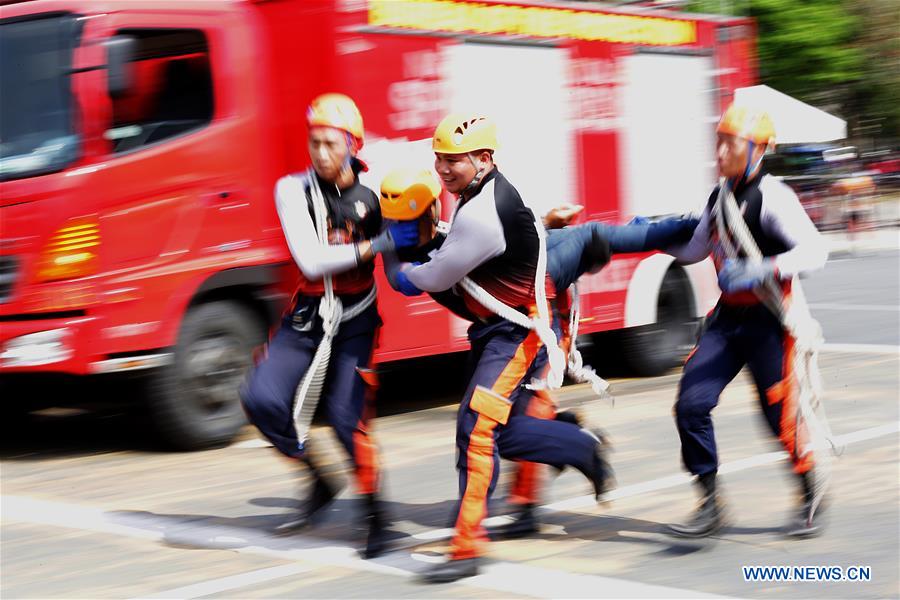 Fire volunteers participate in National Fire Olympics in Manila