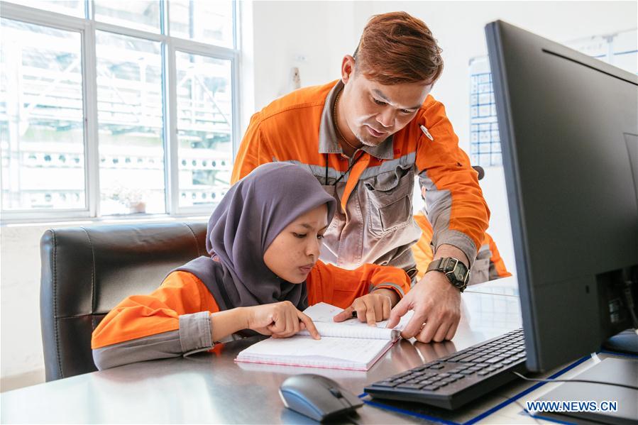 MALAYSIA-KUANTAN-CHINESE STEEL MILL-MALAYSIAN GRADUATE