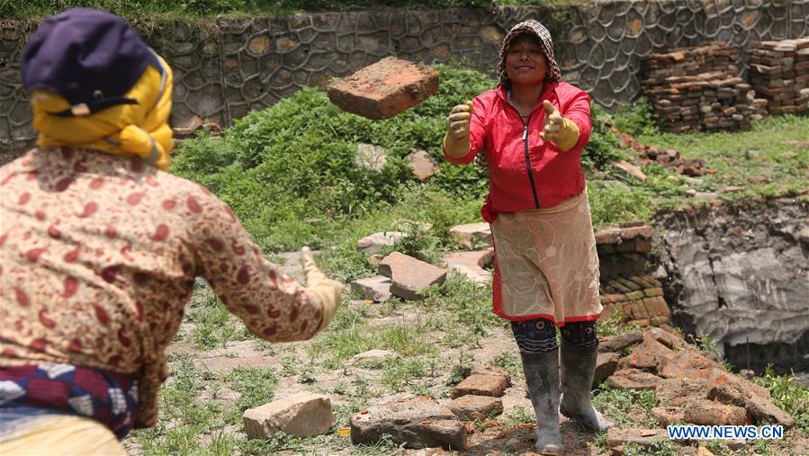 NEPAL-KATHMANDU-RANIPOKHARI POND-RECONSTRUCTION-FEMALE WORKERS