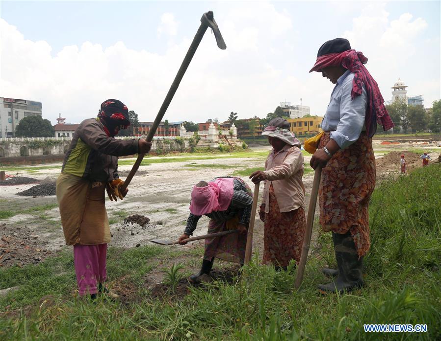 NEPAL-KATHMANDU-RANIPOKHARI POND-RECONSTRUCTION-FEMALE WORKERS