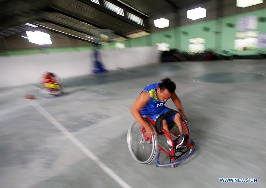 (SP)MYANMAR-YANGON-WHEELCHAIR BASKETBALL PLAYER-TRAINING