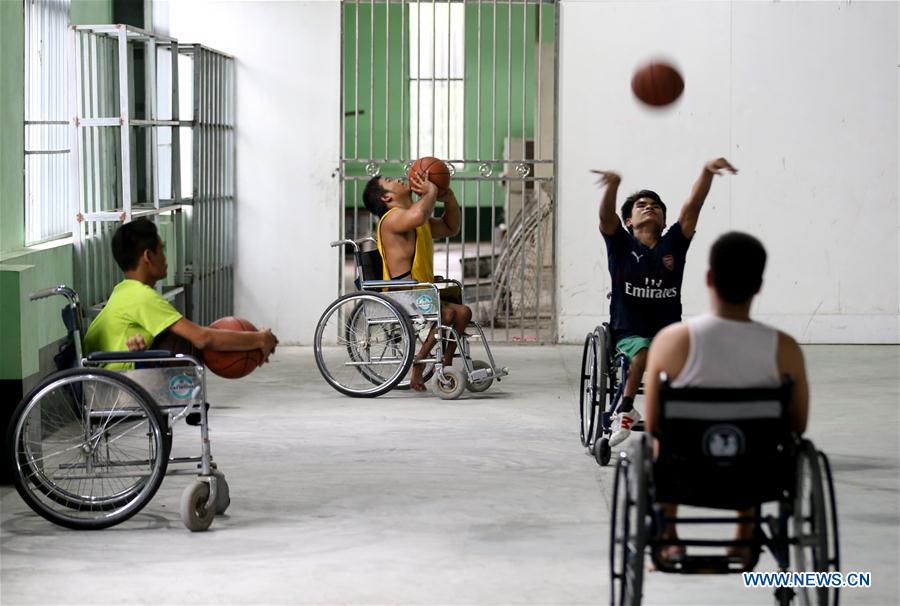 (SP)MYANMAR-YANGON-WHEELCHAIR BASKETBALL PLAYER-TRAINING