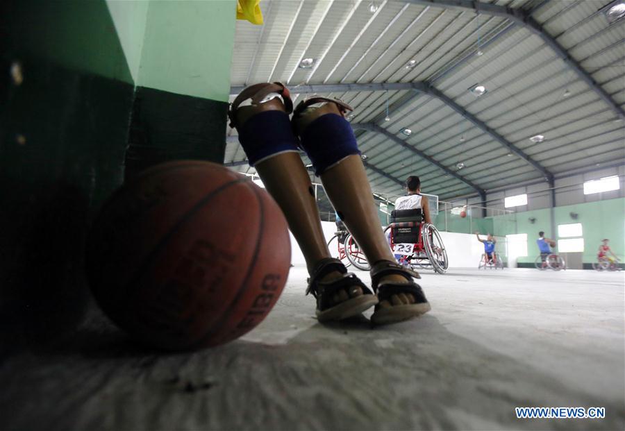 (SP)MYANMAR-YANGON-WHEELCHAIR BASKETBALL PLAYER-TRAINING