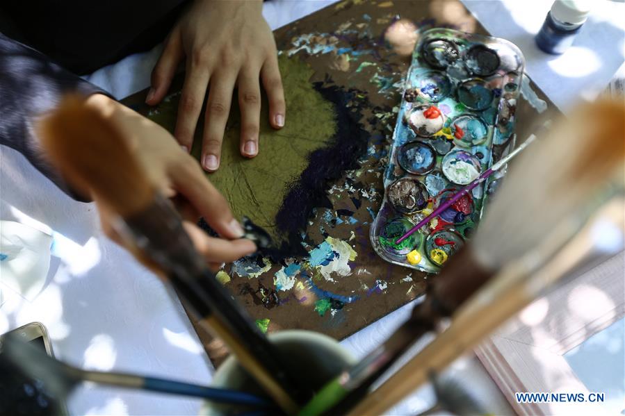 MIDEAST-GAZA-LEAF PAINTING ARTIST