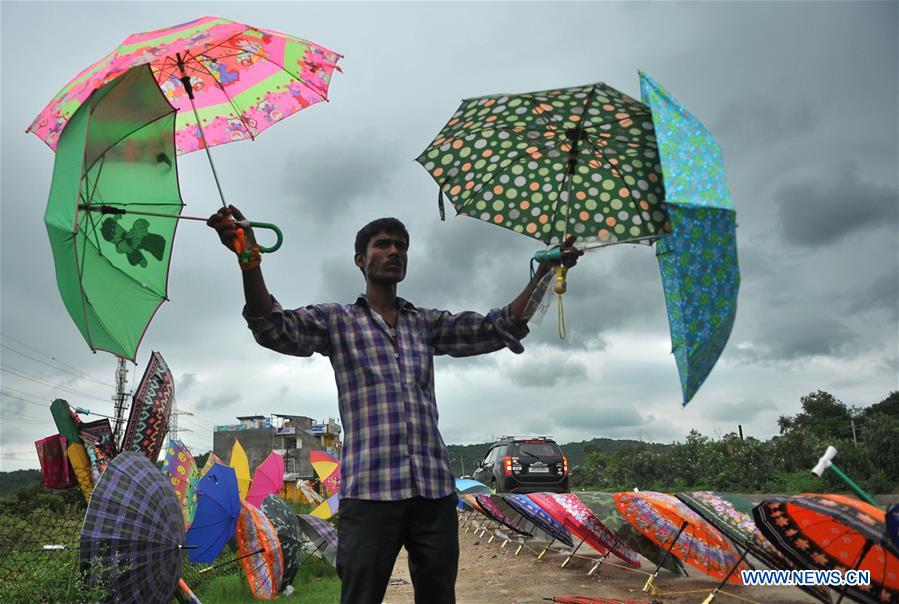 selling umbrellas