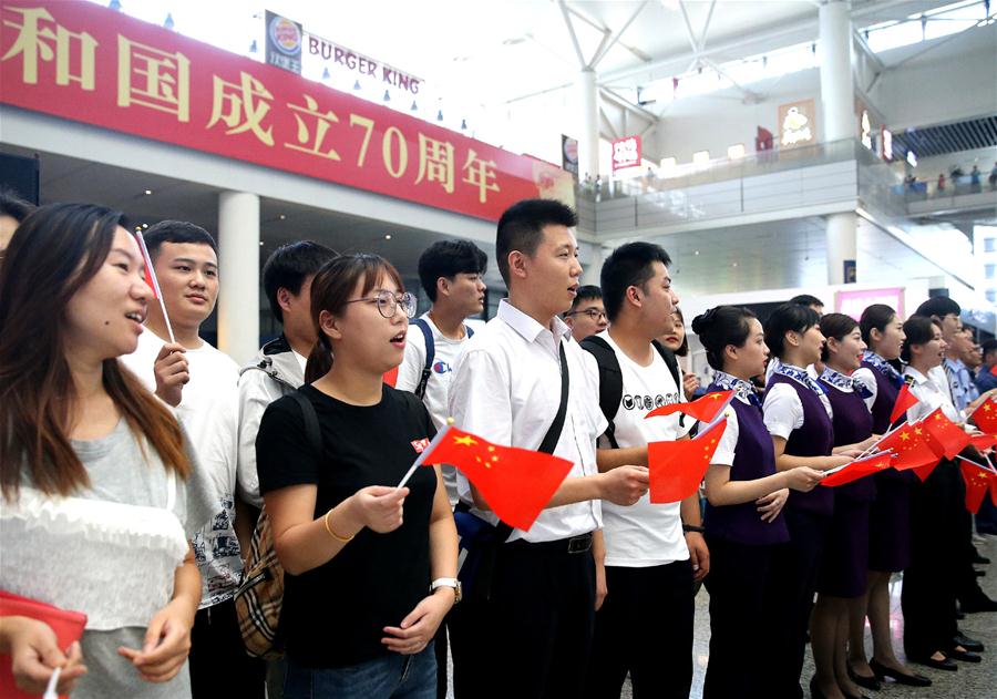 People Take Part in Flash Mob in Shanghai to Celebrate 70th Anniversary of PRC Founding