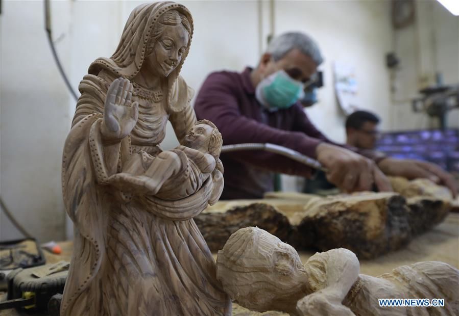 MIDEAST-BETHLEHEM-CARPENTER-WOOD-STATUE