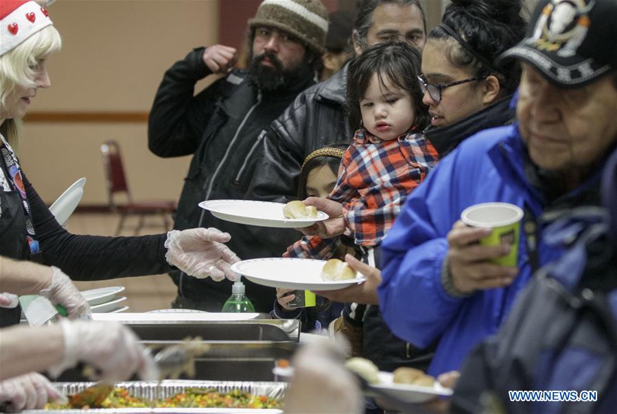 Annual Christmas Dinner For Low-income People Held In Vancouver 