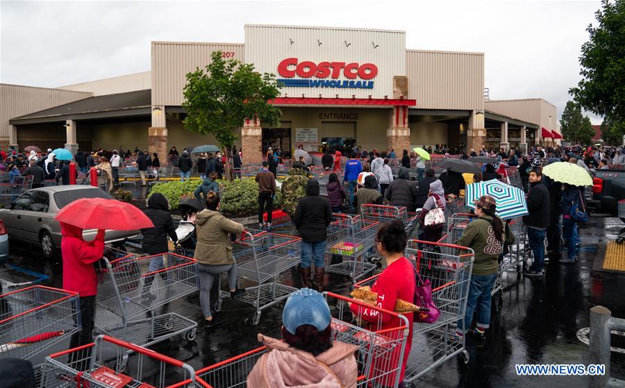 Local residents go shopping at Costco supermarket in Los Angeles amid