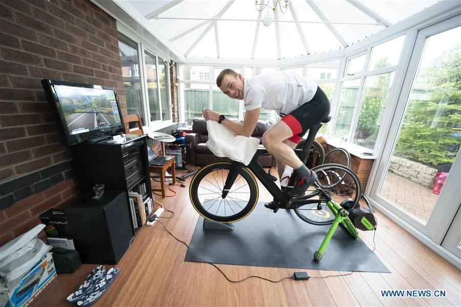 (SP)BRITAIN-NEWCASTLE-UNDER-LYME-COVID-19-TRIATHLETE TRAINING AT HOME