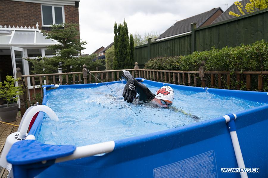 (SP)BRITAIN-NEWCASTLE-UNDER-LYME-COVID-19-TRIATHLETE TRAINING AT HOME