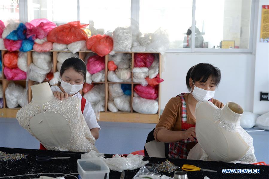 CHINA-ANHUI-LU'AN-WEDDING DRESS INDUSTRY-PRODUCTION (CN)