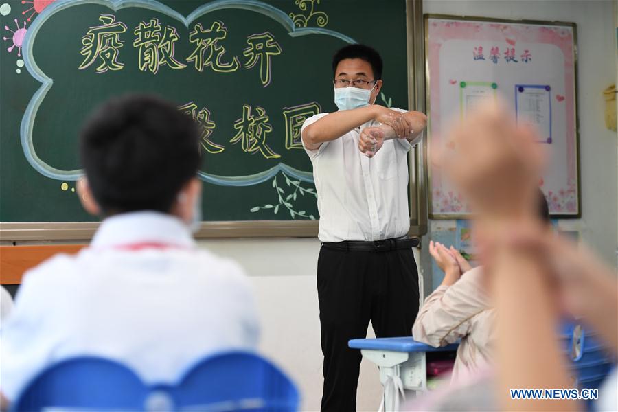 CHINA-BEIJING-SCHOOLS-REOPEN