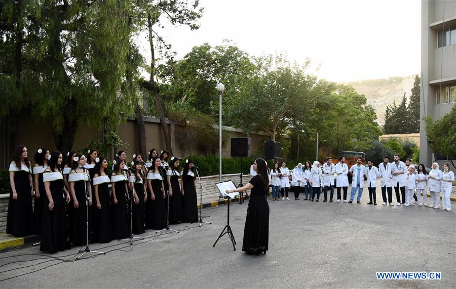 SYRIA-DAMASCUS-CHOIR-COVID-19-MEDICAL WORKERS