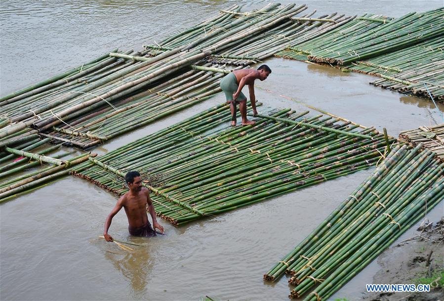 INDIA-AGARTALA-BAMBOO POLES